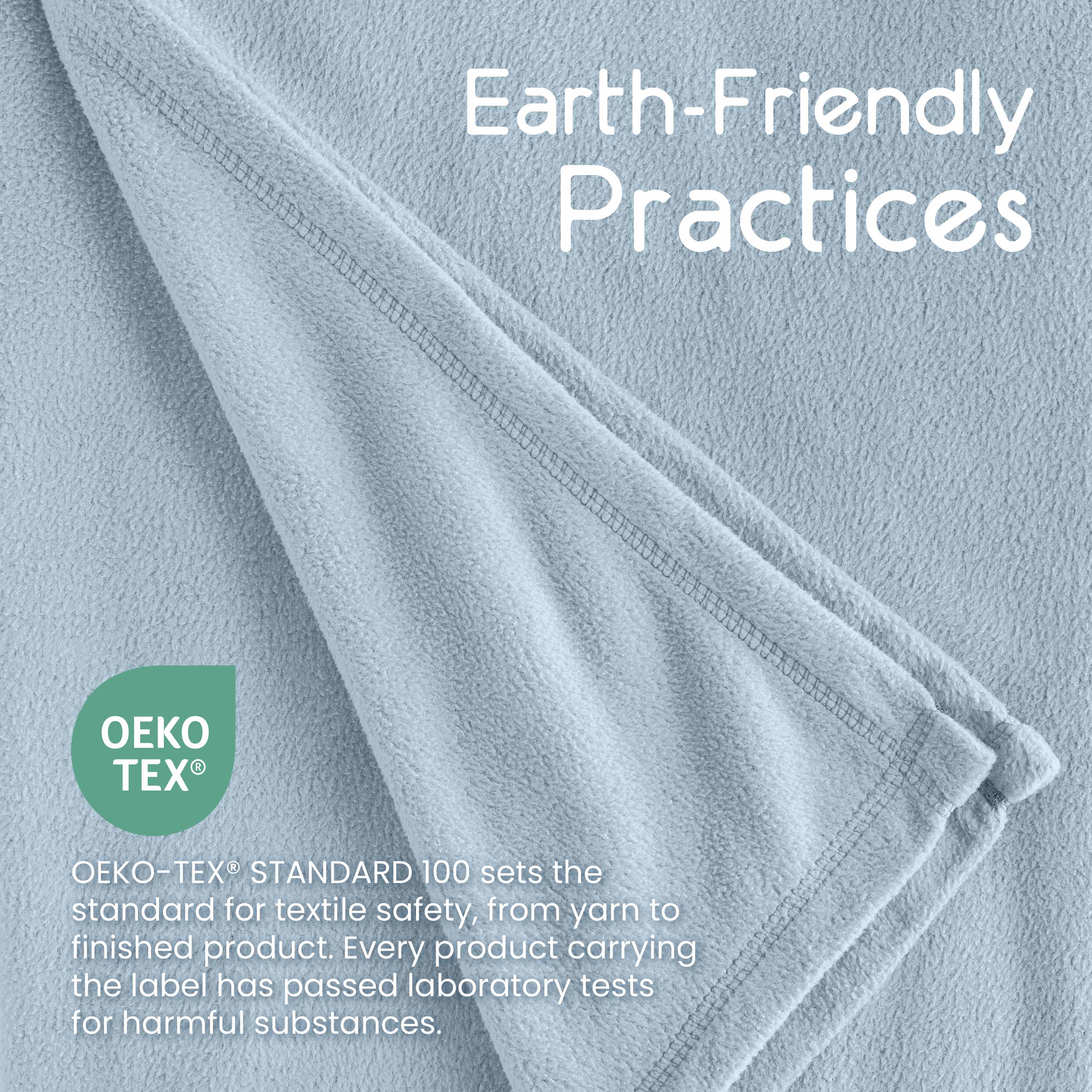 Light blue micro fleece blanket with a soft texture and stitched edges, featuring an OEKO-TEX® label for safety standards.