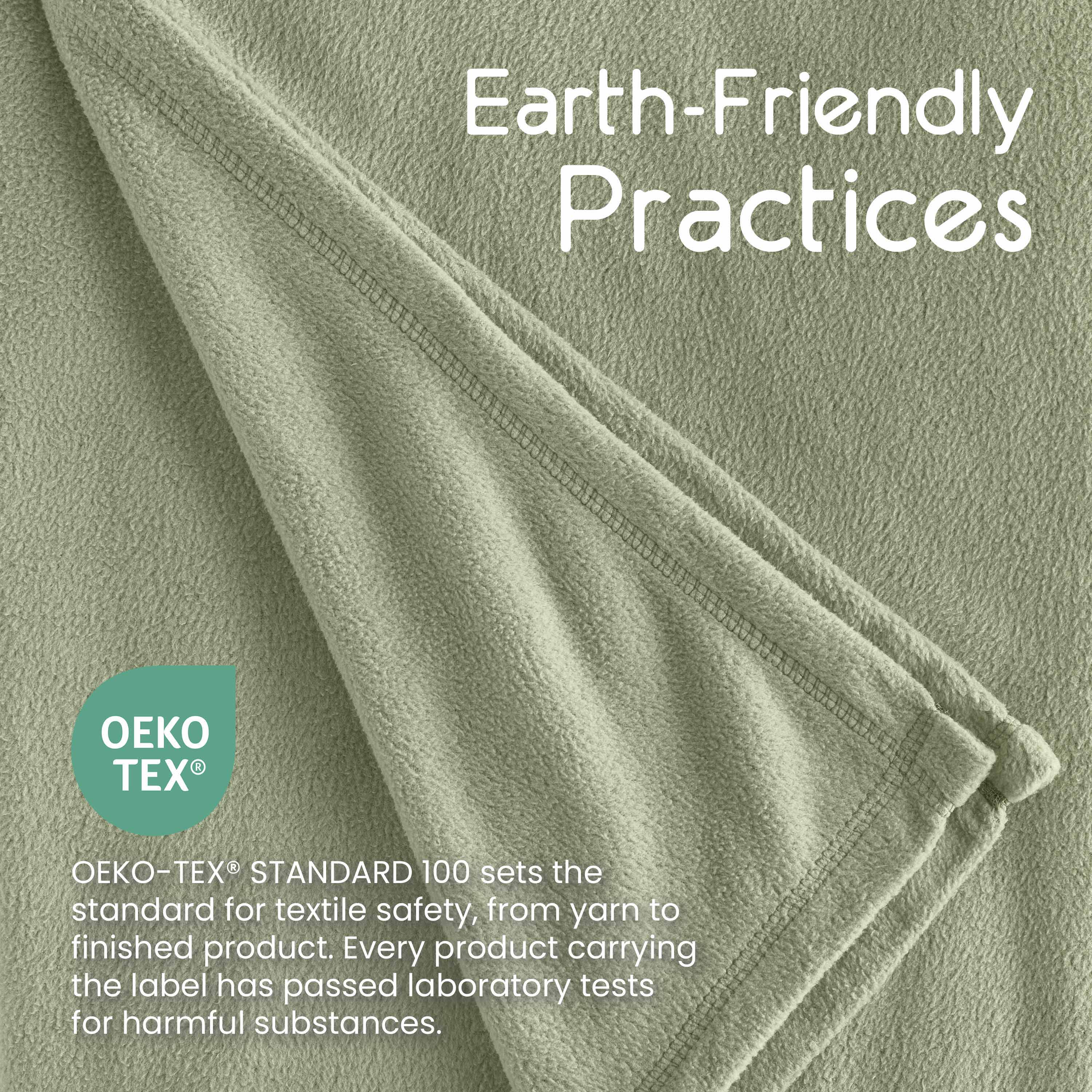 Light green micro fleece blanket with a soft texture and stitched edges, featuring Oeko-Tex certification information.