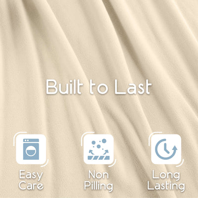 Light beige micro fleece blanket with a soft texture and care icons for easy maintenance and durability.