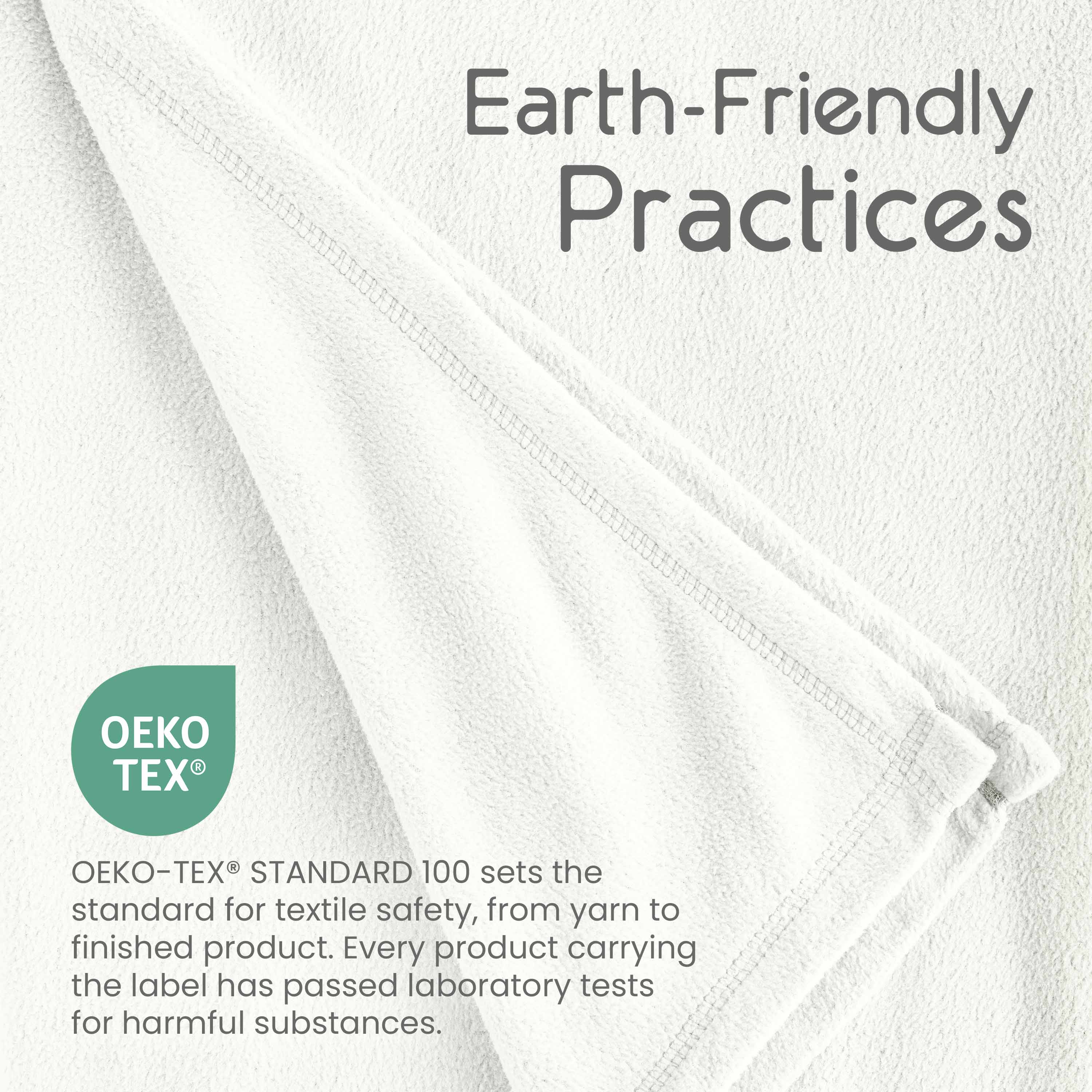 White micro fleece blanket with a folded edge, featuring text about earth-friendly practices and Oeko-Tex certification.