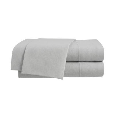 Gray sheet set folded neatly, featuring a soft texture and stitched edges.