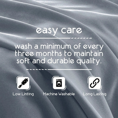 Gray fabric with care instructions text and icons on a gray background