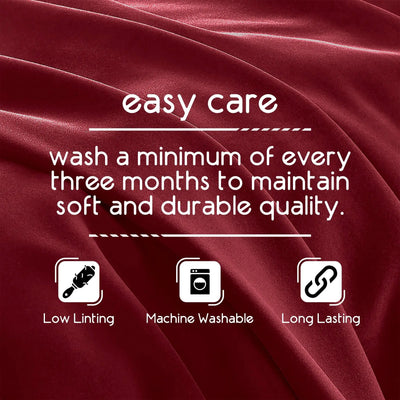 Red fabric with care instructions text and icons on a red background