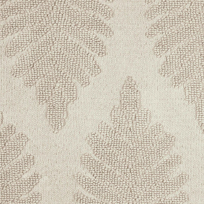 Textured bath rug featuring a fern ogee pattern in neutral tones.