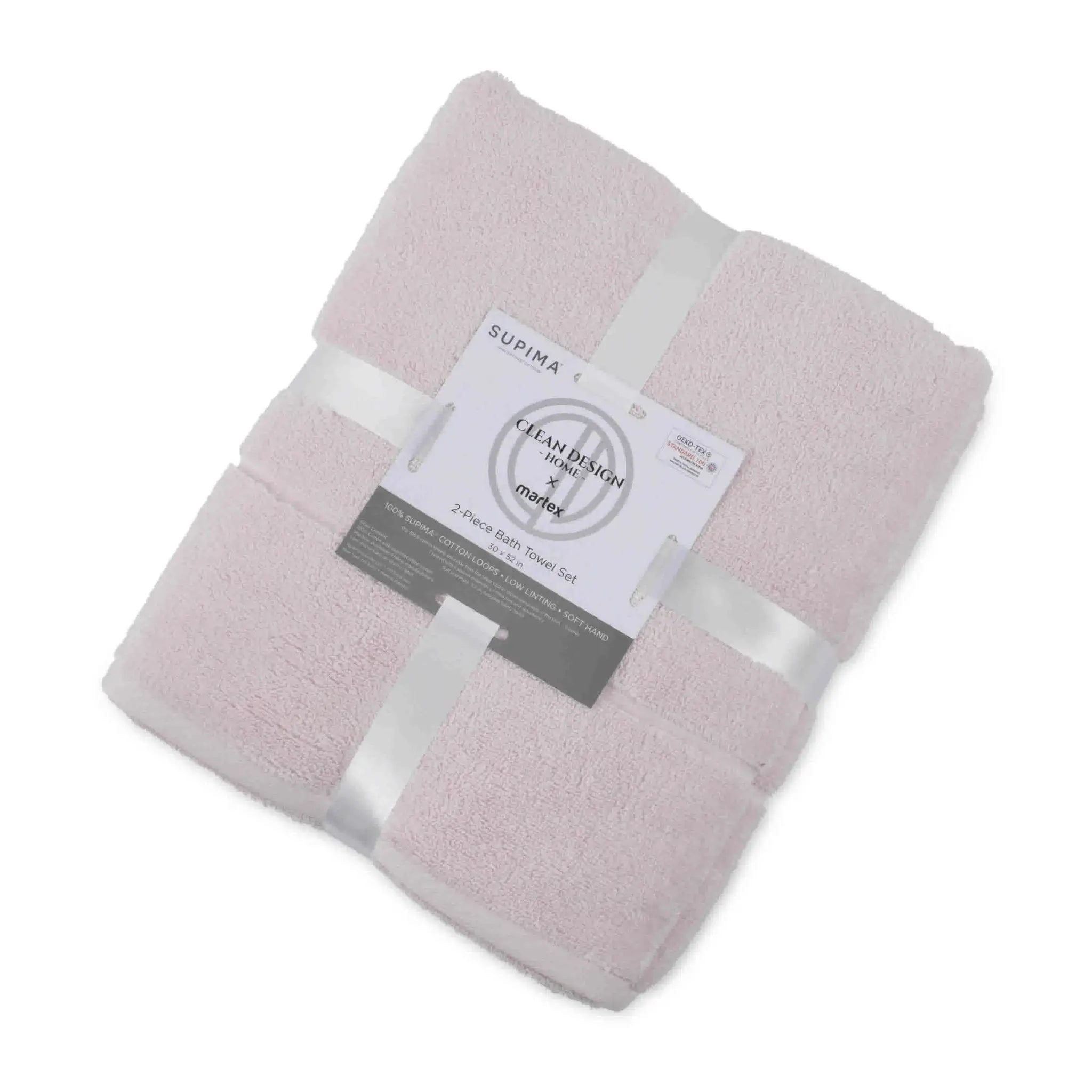 Folded blush bath towel set with a label on a white background