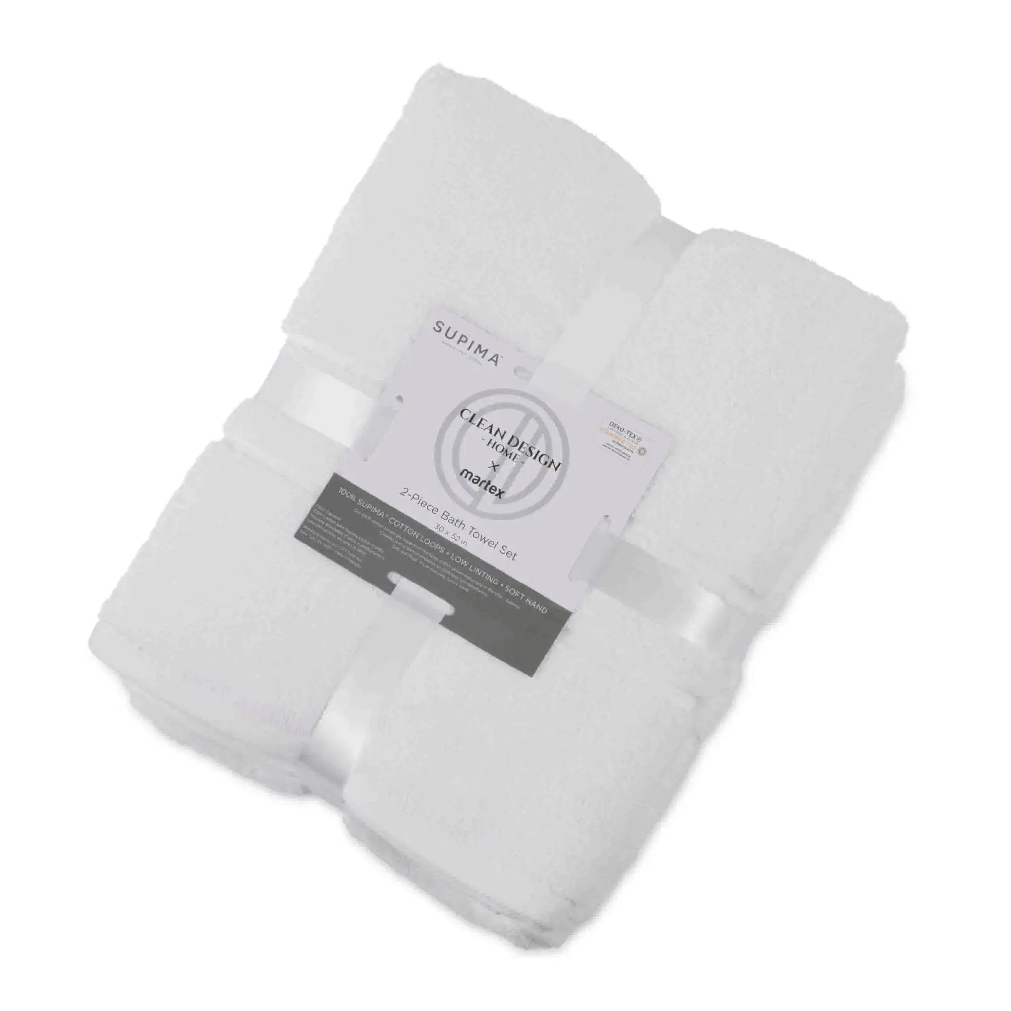 Folded white bath towel set with a label on a white background