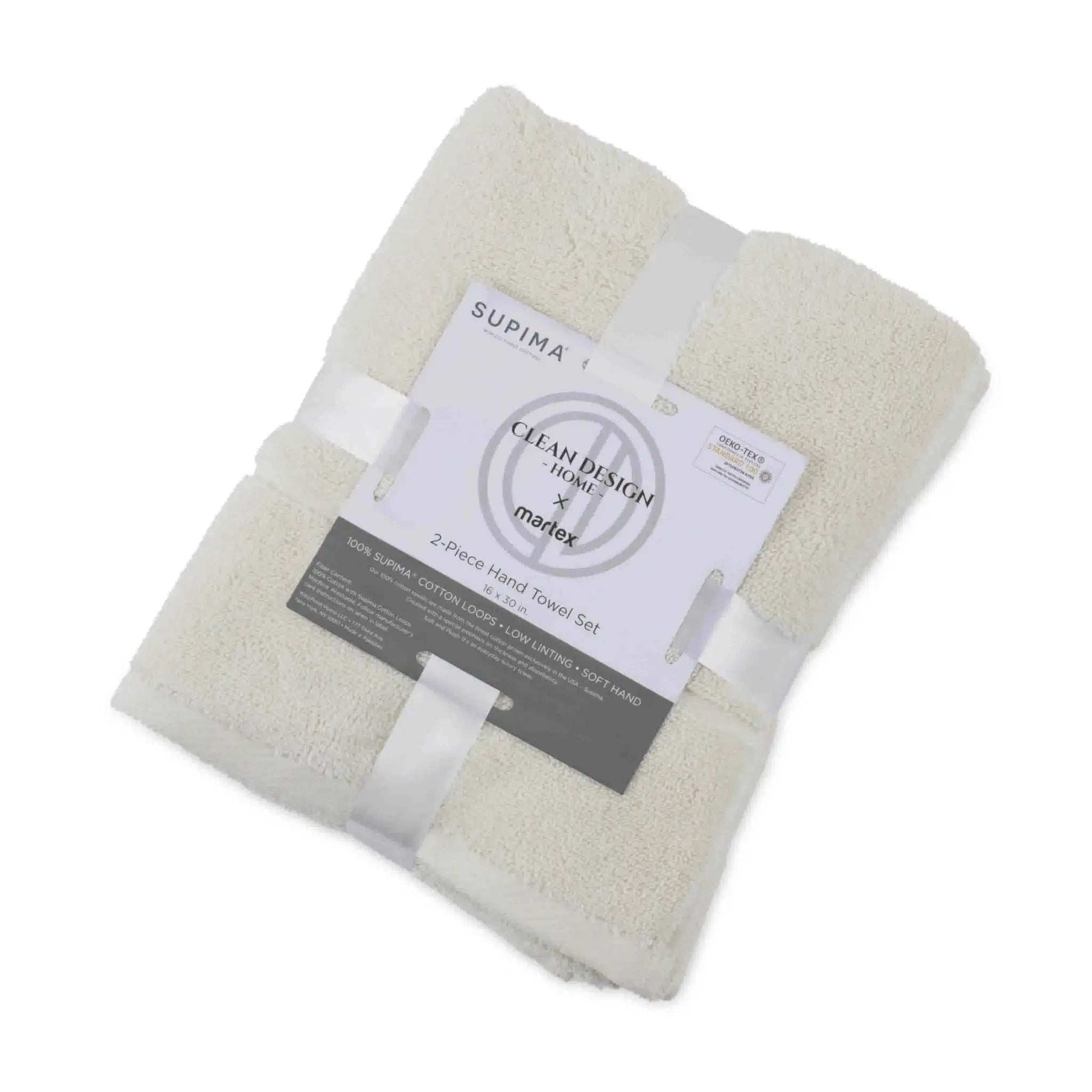 A folded set of two ivory terry hand towels wrapped in white ribbons with a paper label that reads 'SUPIMA' and 'Clean Design by Martex'.