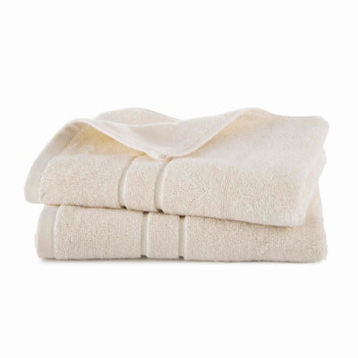 Stack of ivory towels on a white background