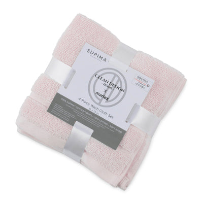 Pink towel set with Supima label on a white background