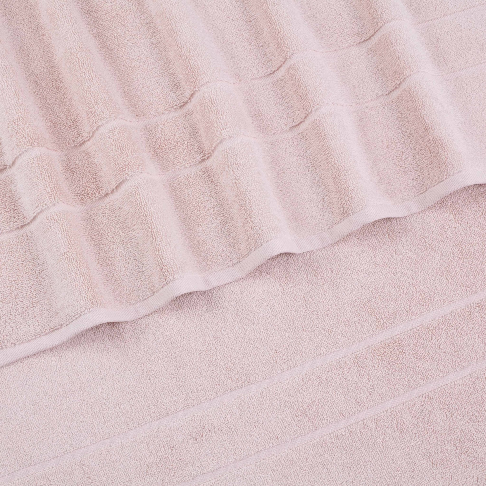 Close-up of a textured pink fabric surface