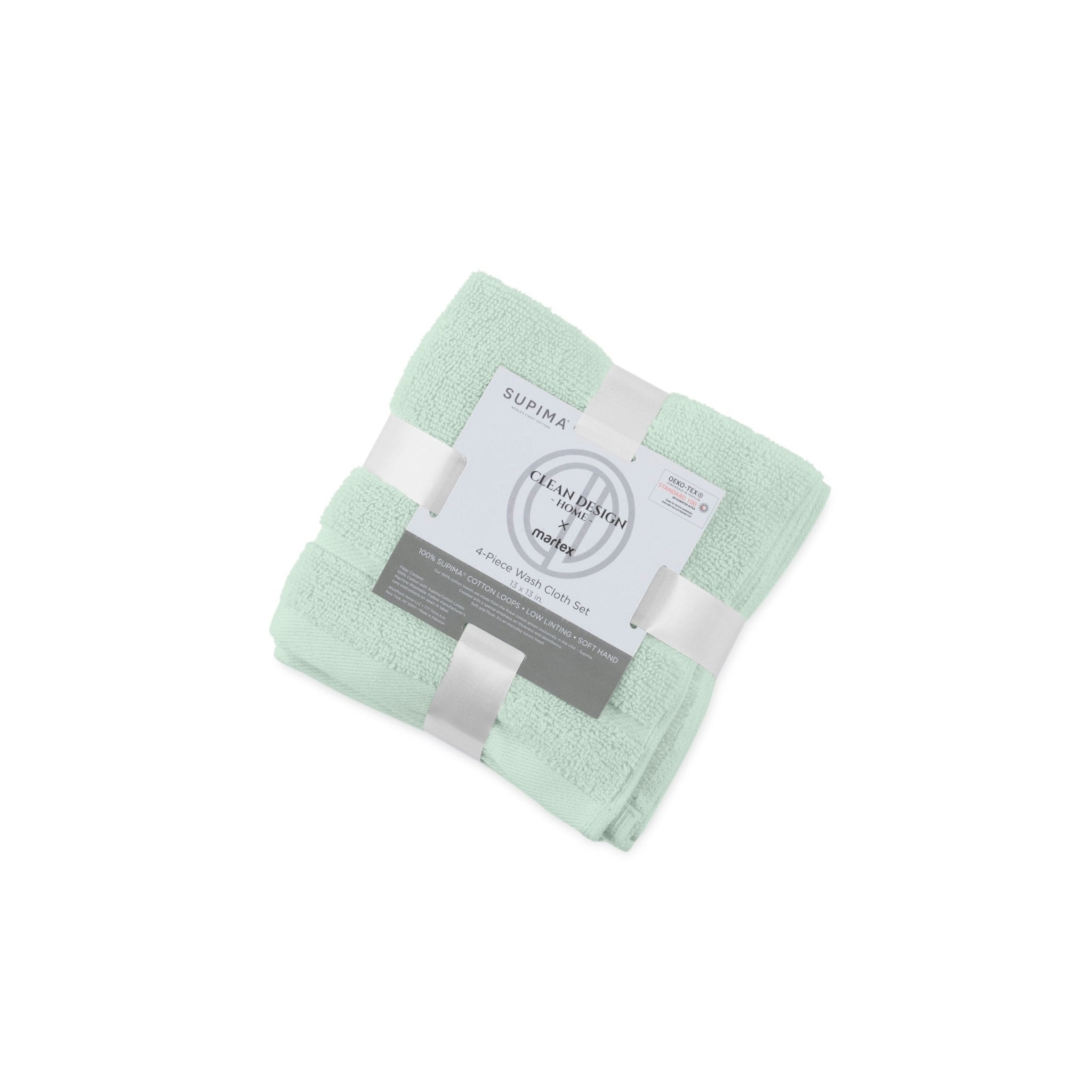 Folded light green washcloth with a label on a white background