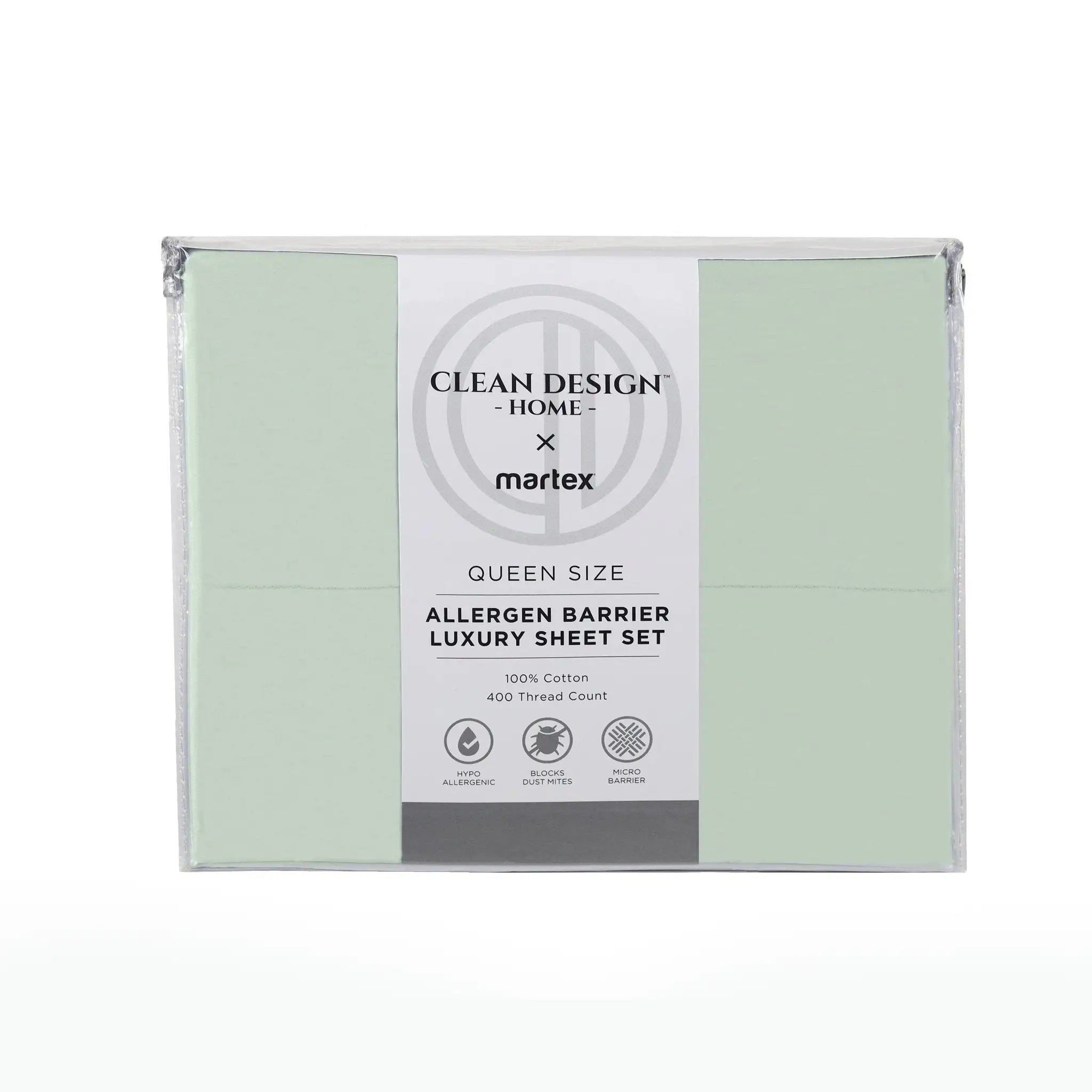 A packaged sheet set box labeled 'Clean Design Home x martex' with pale sage green bedding visible through clear plastic wrapping, on a white background.