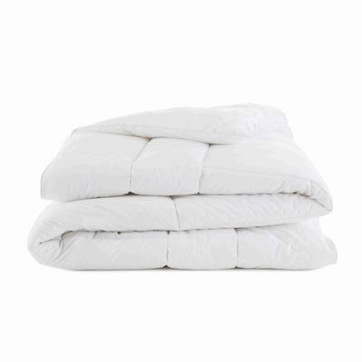 White comforter on a white background