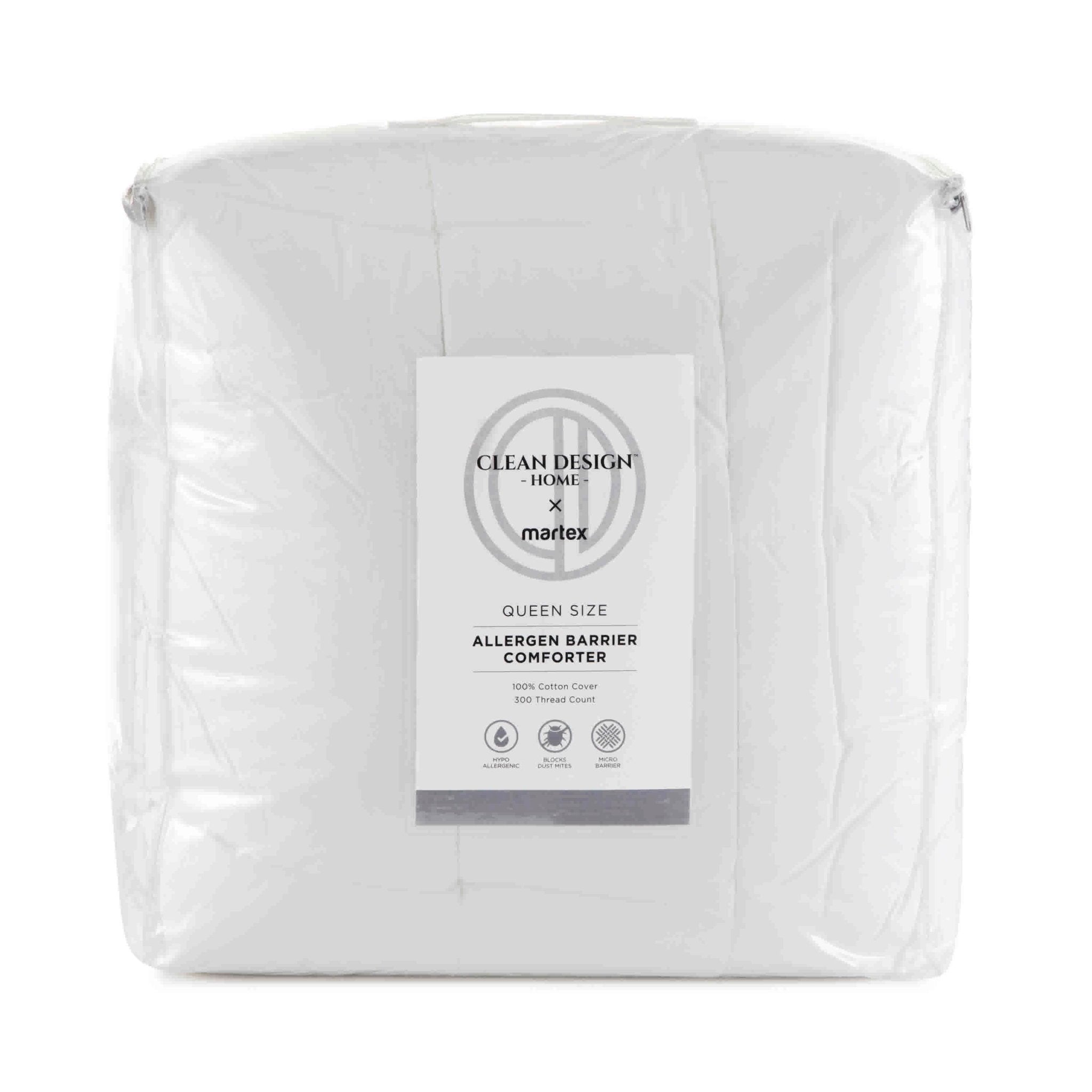 Packaged white comforter with Clean Design Home and Martex labels on a white background