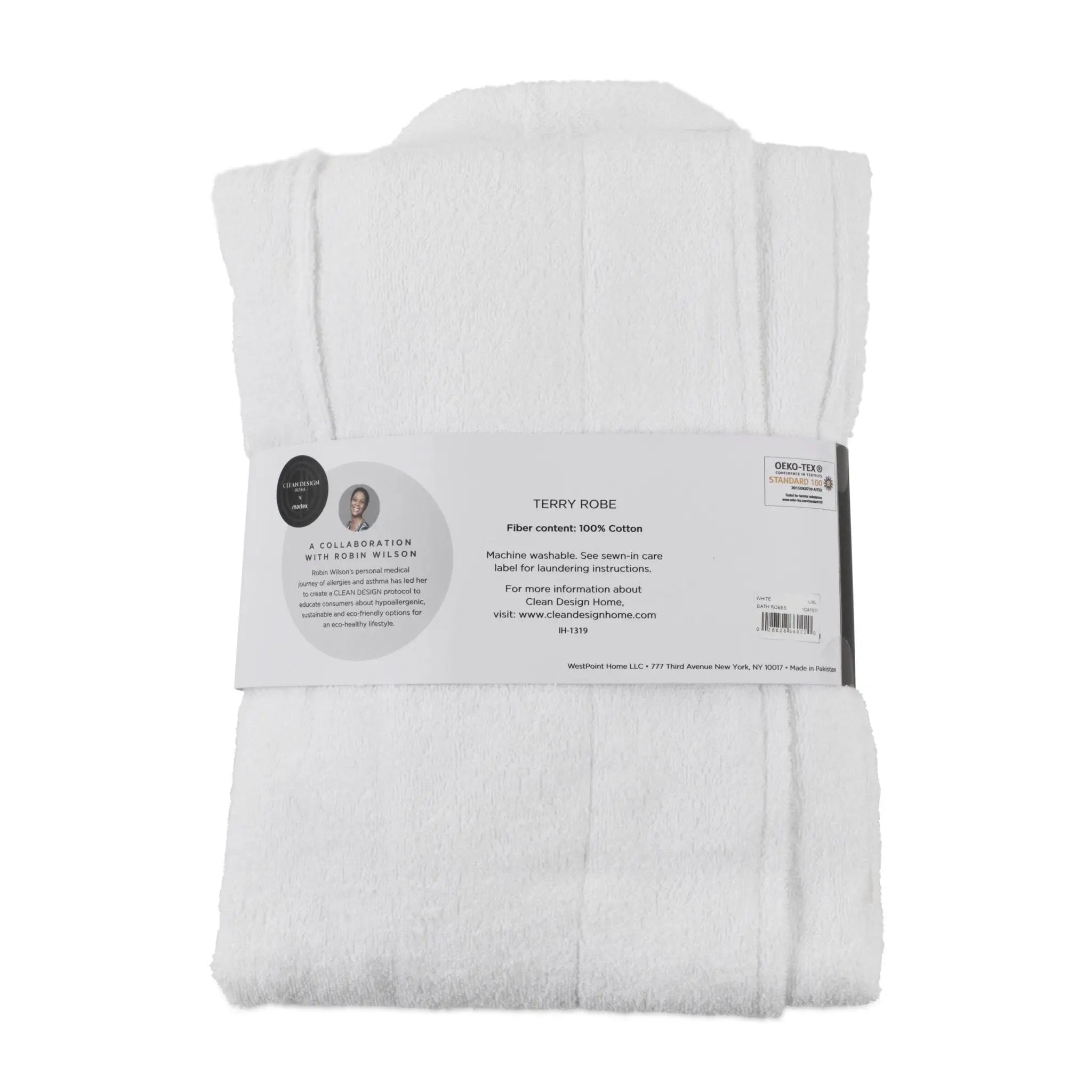 A folded white terry cloth bath towel with a paper label band, against a plain white background.
