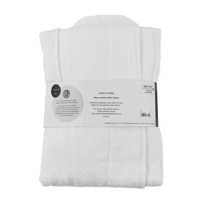 A folded white terry cloth bath towel with a paper label band, against a plain white background.