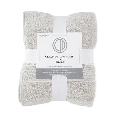 Set of two gray hand towels with a visible brand label on a white background