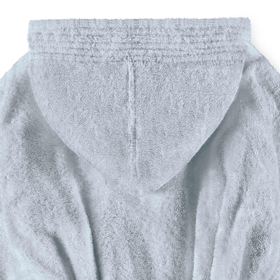 Light blue hooded bath robe with textured fabric and a simple design.