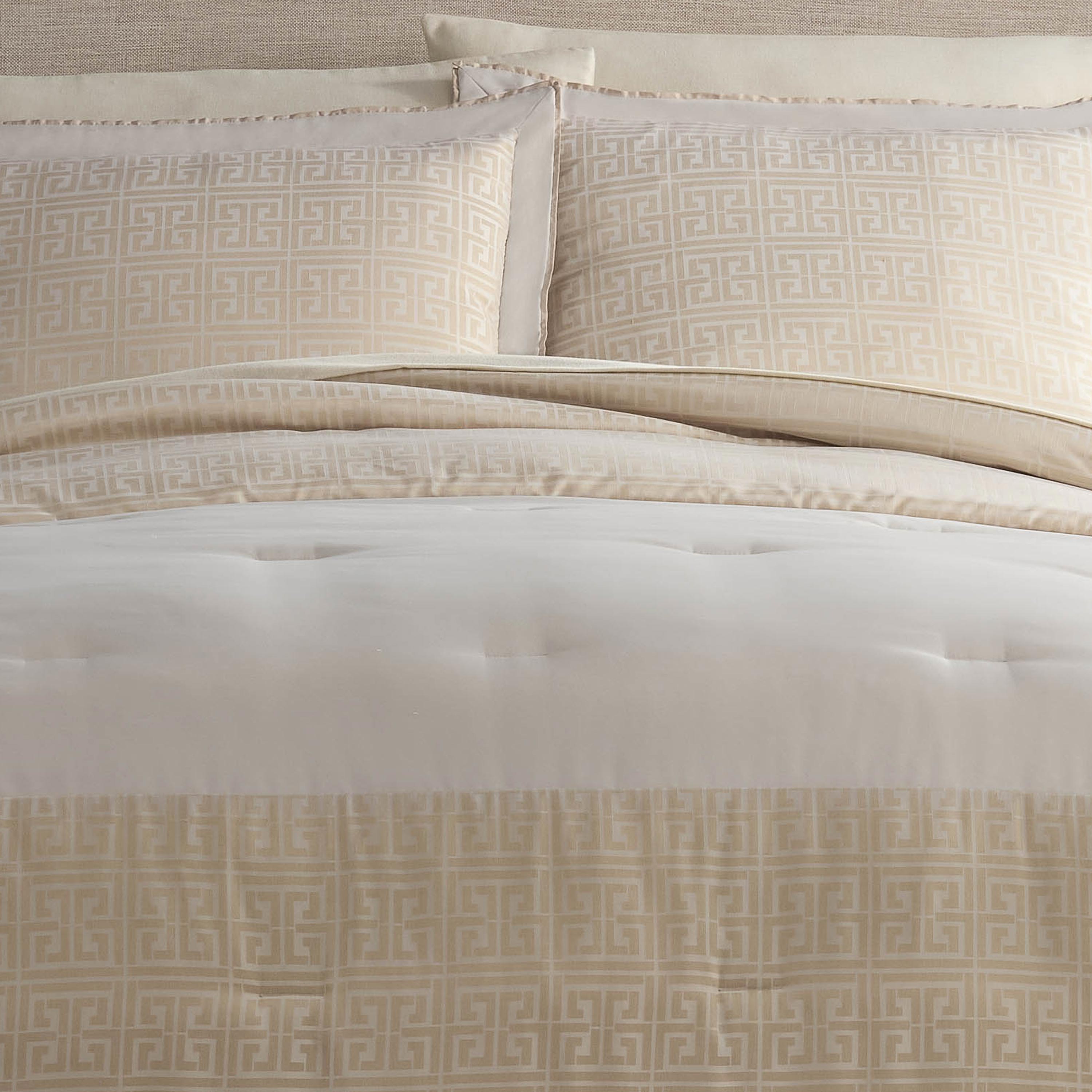 Comforter set featuring a geometric pattern in beige and cream, with matching pillow shams.
