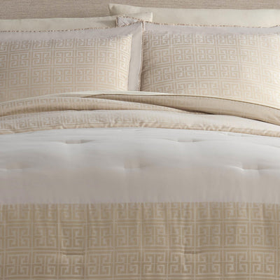 Comforter set featuring a geometric pattern in beige and cream, with matching pillow shams.