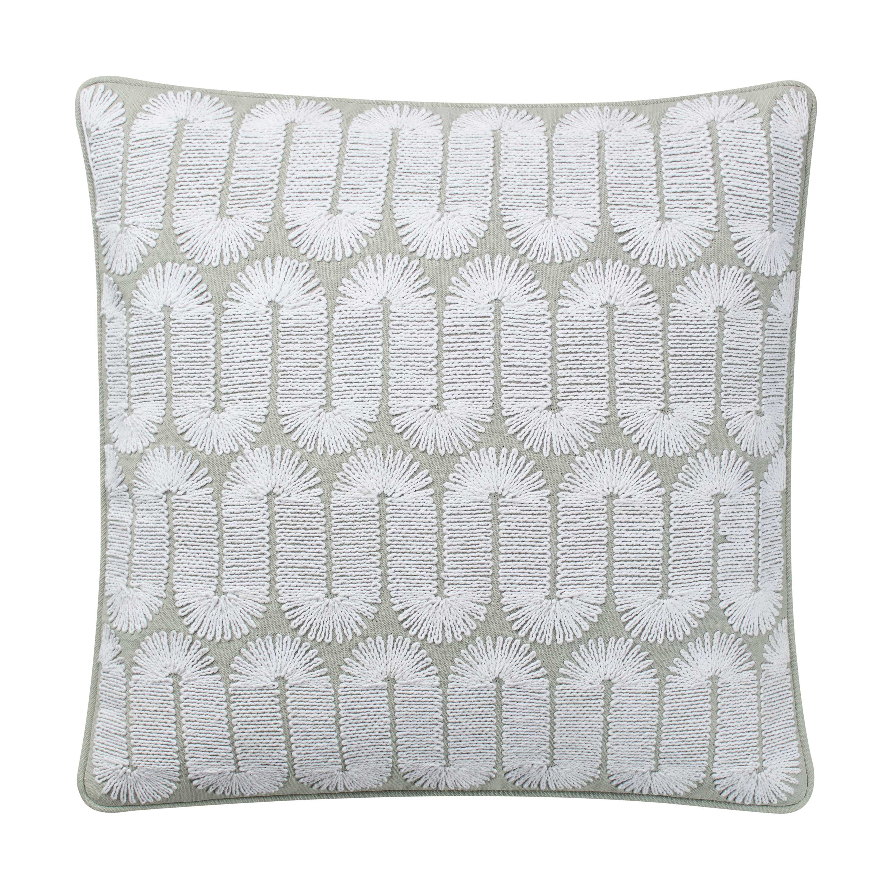 Square decorative pillow in gray with white embroidered pattern.
