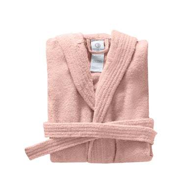 Hooded bath robe in soft pink, folded with a tie belt and care label visible.