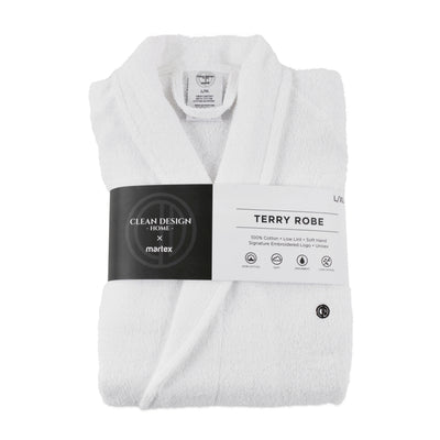 White terry bath robe folded with a black label displaying brand and product details.
