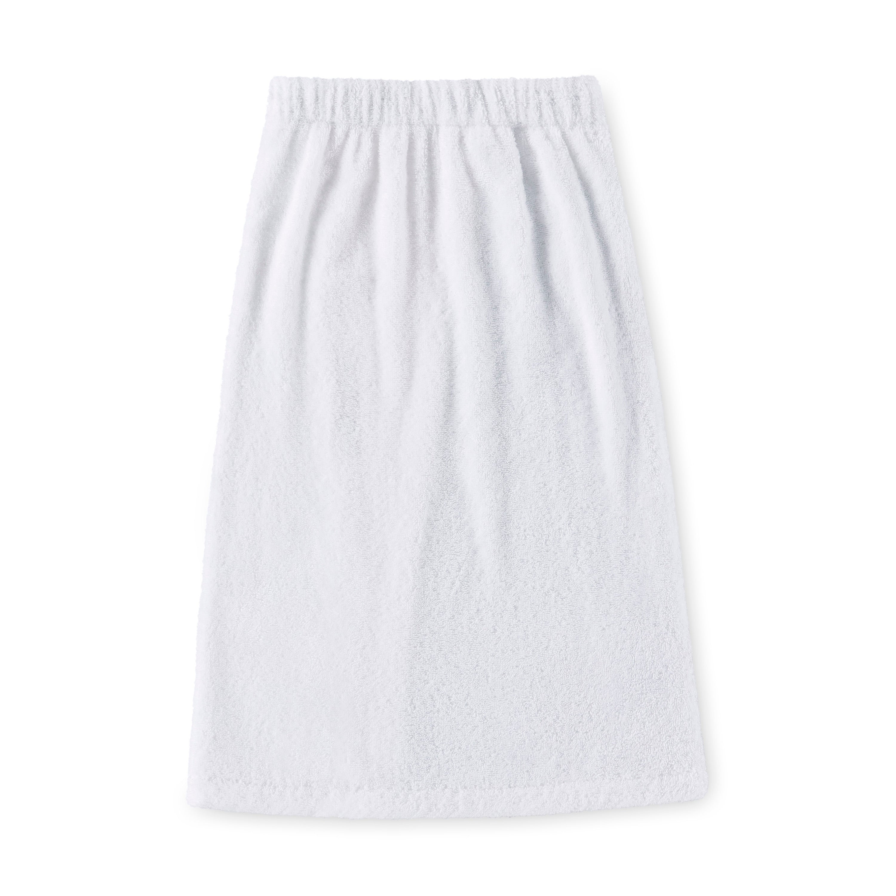 White youth shower wrap with an elastic waistband and a soft, textured fabric.