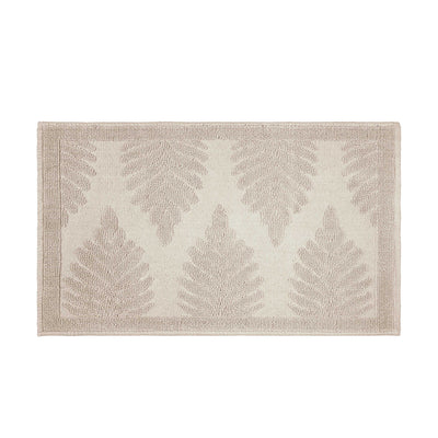 Rectangular bath rug featuring a fern ogee pattern in neutral tones with a textured border.