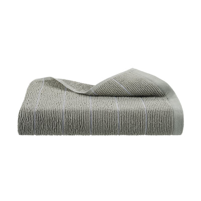 Gray towel with a textured surface and subtle striped pattern.