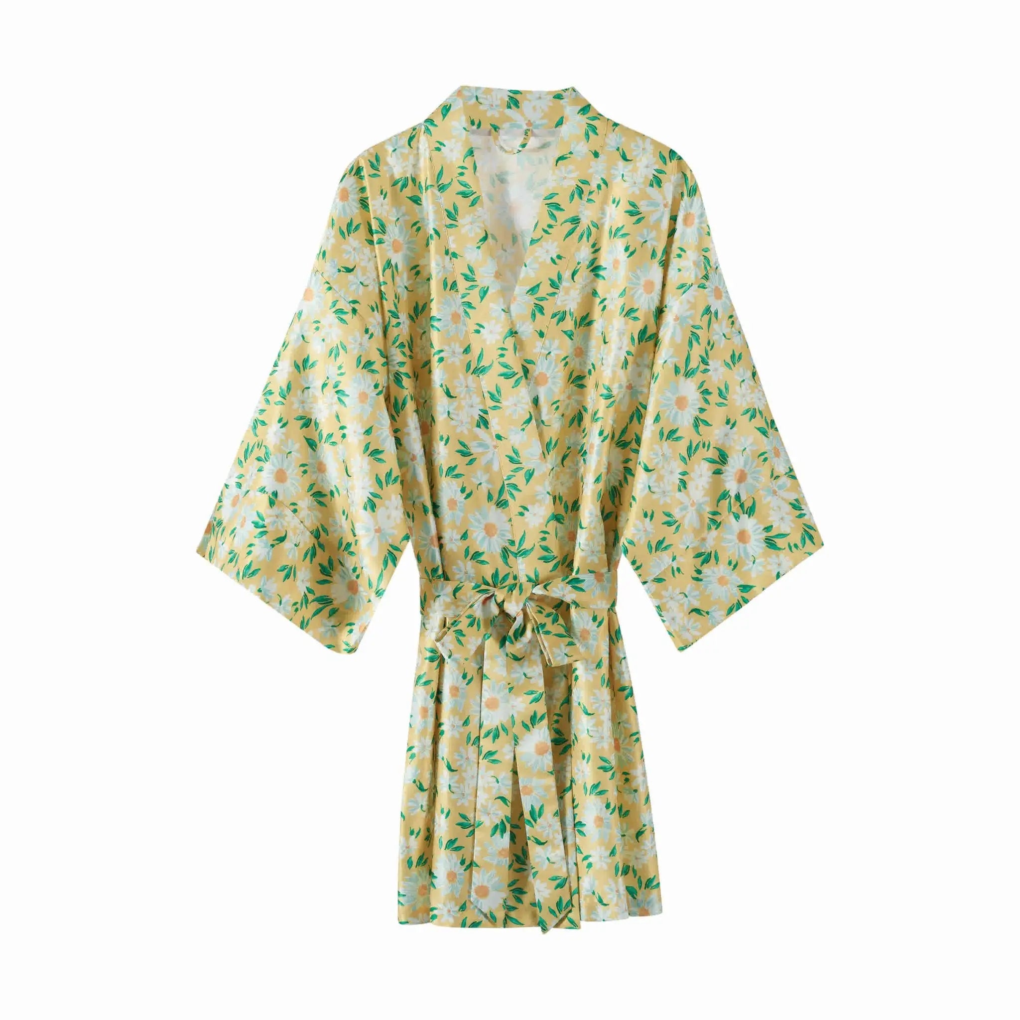 Yellow floral patterned robe on a white background