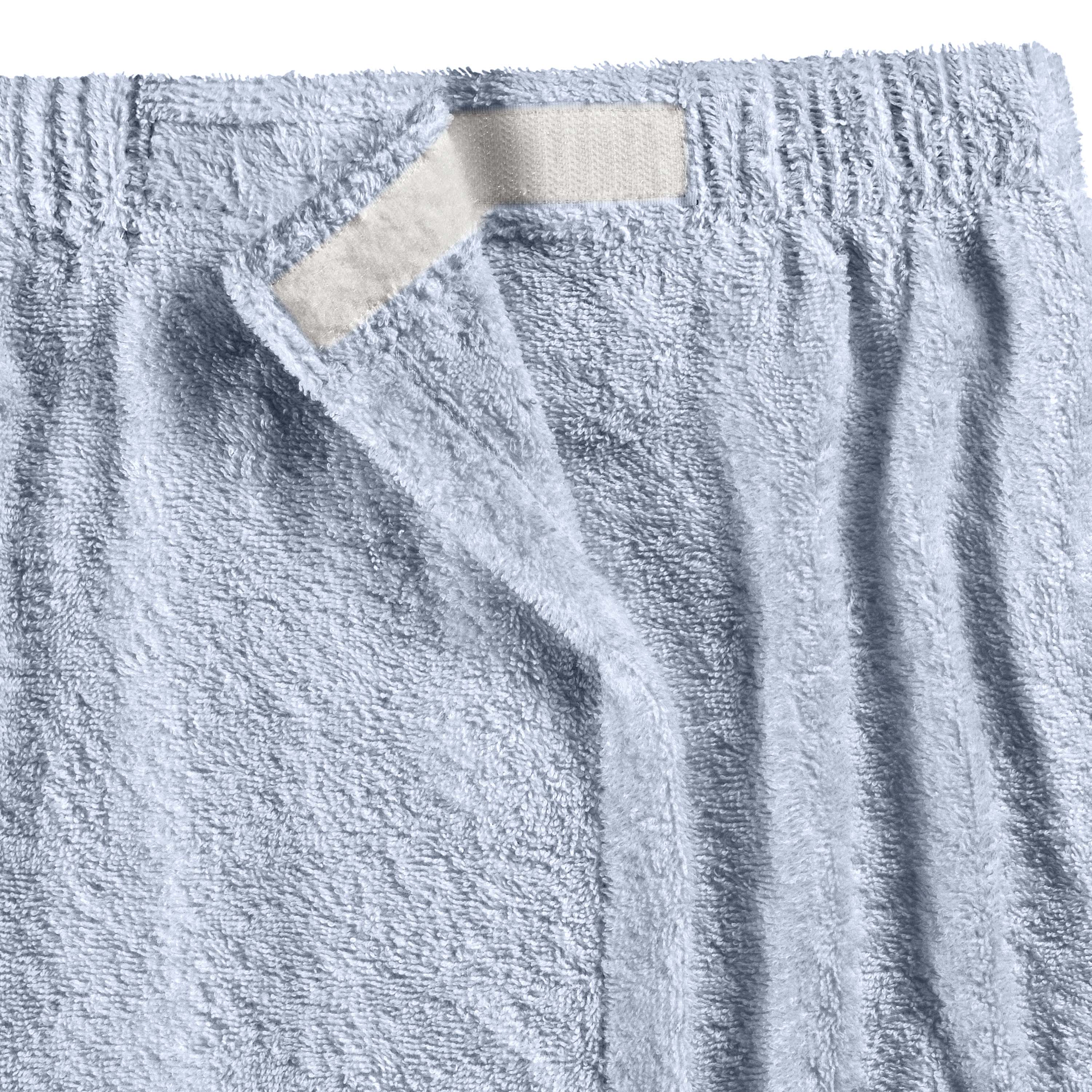 Light blue shower wrap with a textured surface and a velcro closure at the top.