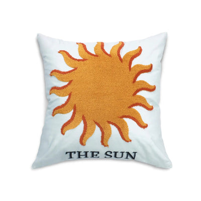 Pillow with a sun design and 'THE SUN' text on a white background