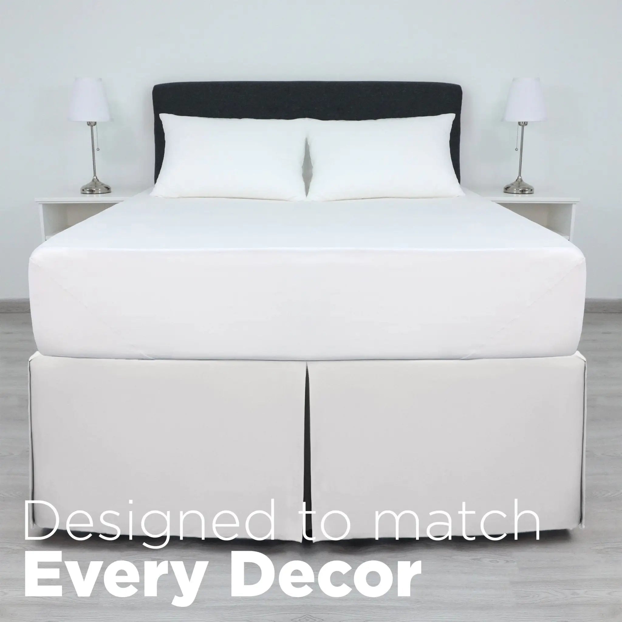 A bed dressed in white bedding, including a white mattress, white pillows, and a white bed skirt.