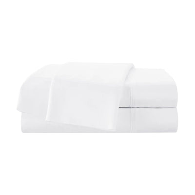 A neatly folded stack of white bedding, likely including a sheet set or folded towels, shown against a solid white background.