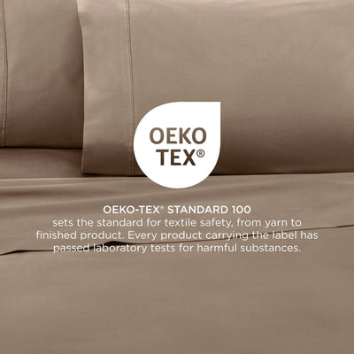 Brown bed sheets with OEKO-TEX certification label on a bed.