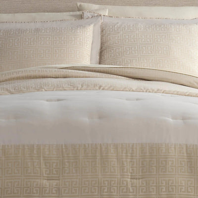 Beige comforter set featuring a tufted comforter with a Greek key pattern border and matching patterned pillow shams.