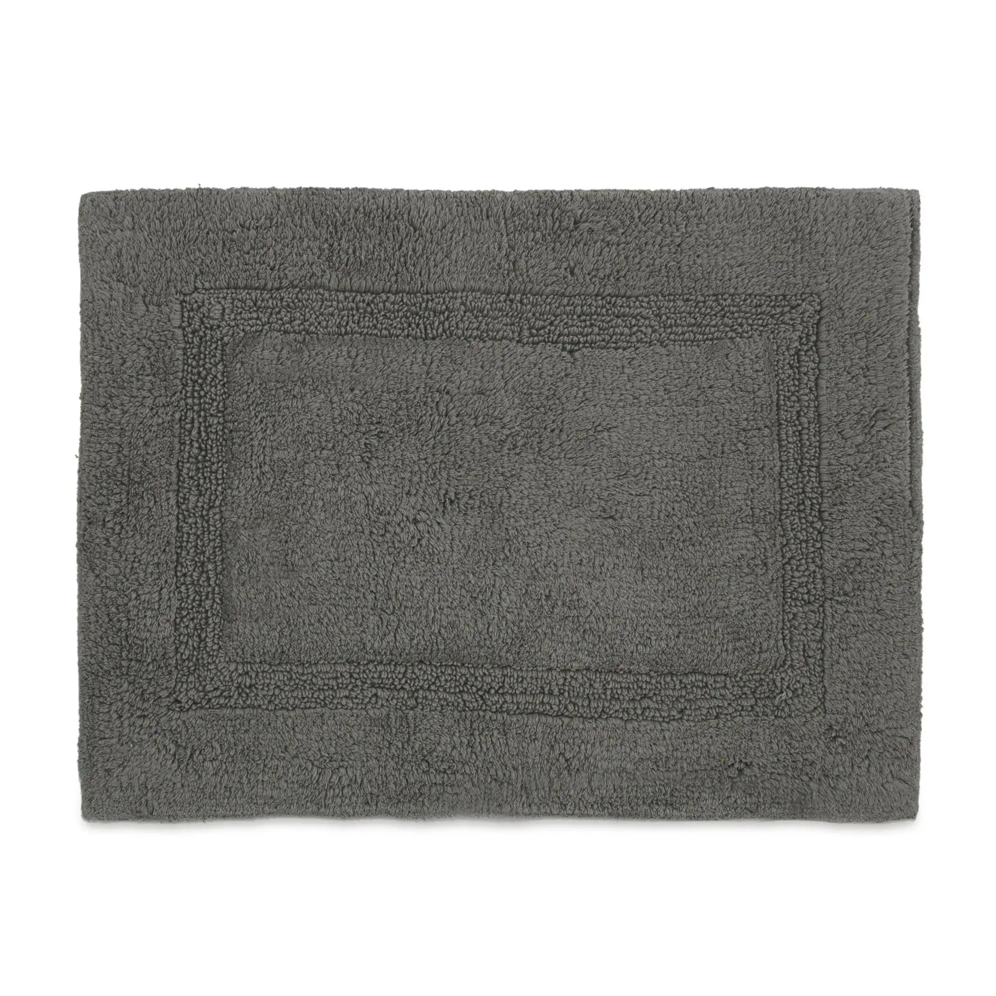 A dark gray rectangular bath rug with a raised border design, shown flat against a plain white background.