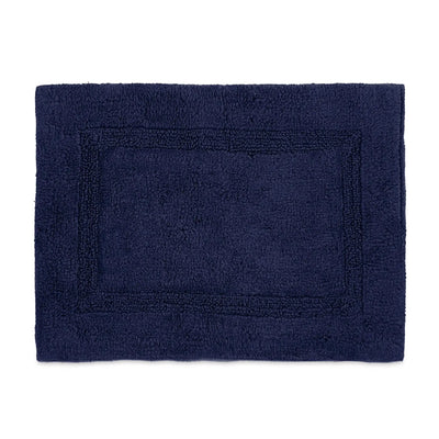 Estate blue bath rug on a white background