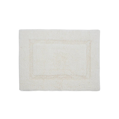 A rectangular bath rug with a raised border design, shown flat against a solid white background.