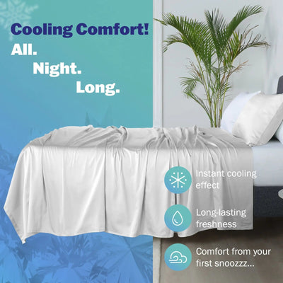 White cooling blanket draped over a bed in a bedroom setting, with promotional text and icons highlighting instant cooling, long-lasting freshness, and comfort during sleep.