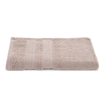 Folded sand towel with textured stripes on a white background