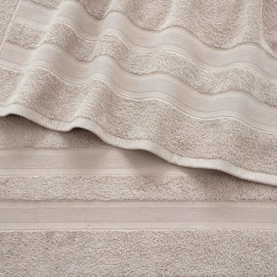 Close-up of textured sand color fabric with wavy pattern