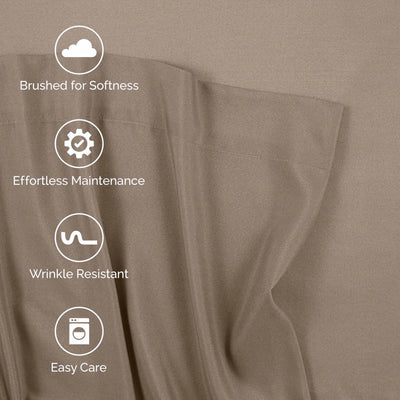 Close-up of beige fabric with four white feature icons and text reading 'Brushed for Softness,' 'Effortless Maintenance,' 'Wrinkle Resistant,' and 'Easy Care.'.
