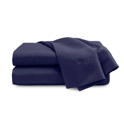A neatly folded stack of navy fabric, likely bedding or a textile set, shown on a plain white background.