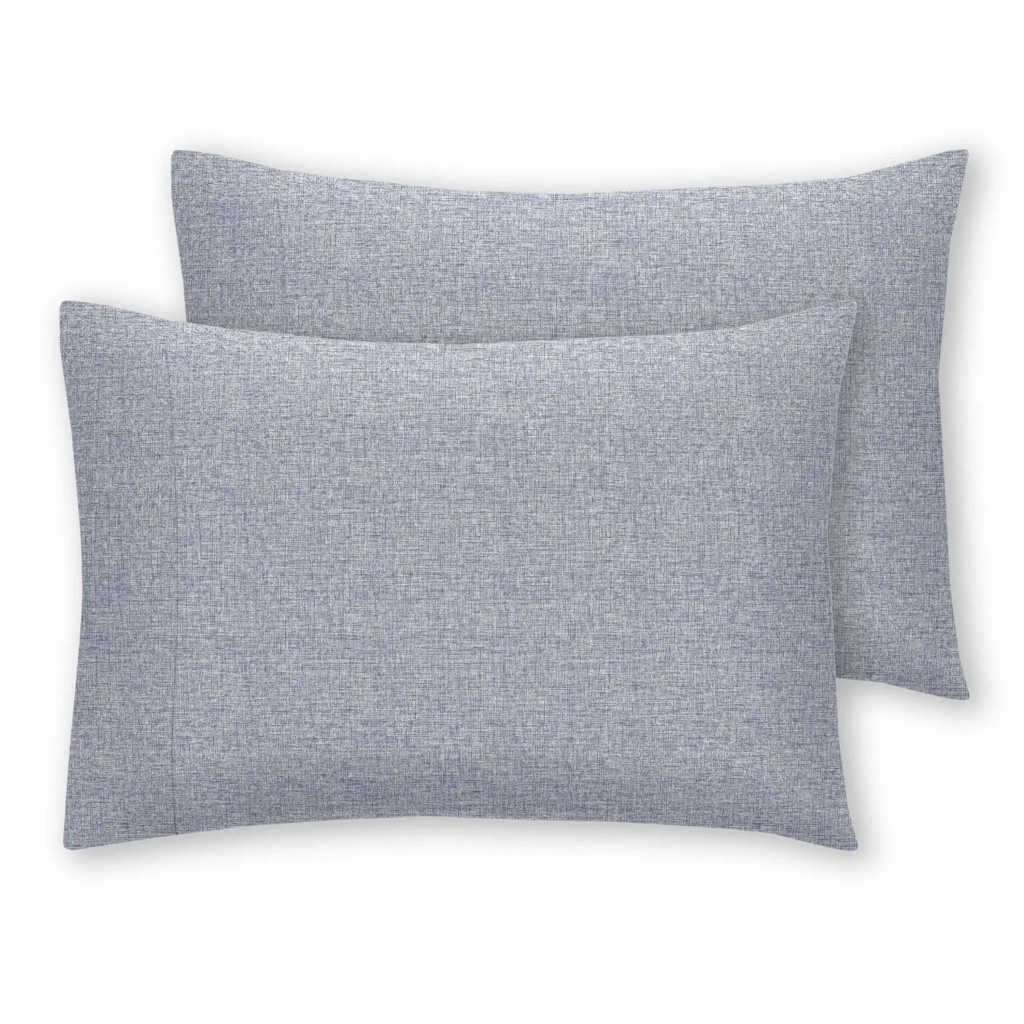 Two rectangular throw pillows in a heathered light blue-gray fabric, arranged with one slightly behind the other on a plain white background.