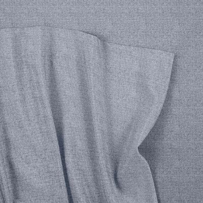 Close-up of gray fabric with a subtle pattern