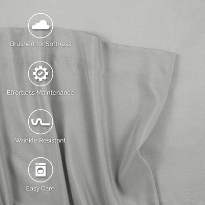 Close-up of light gray fabric with four white feature icons and text reading 'Brushed for Softness,' 'Effortless Maintenance,' 'Wrinkle Resistant,' and 'Easy Care' overlaid on the left side.