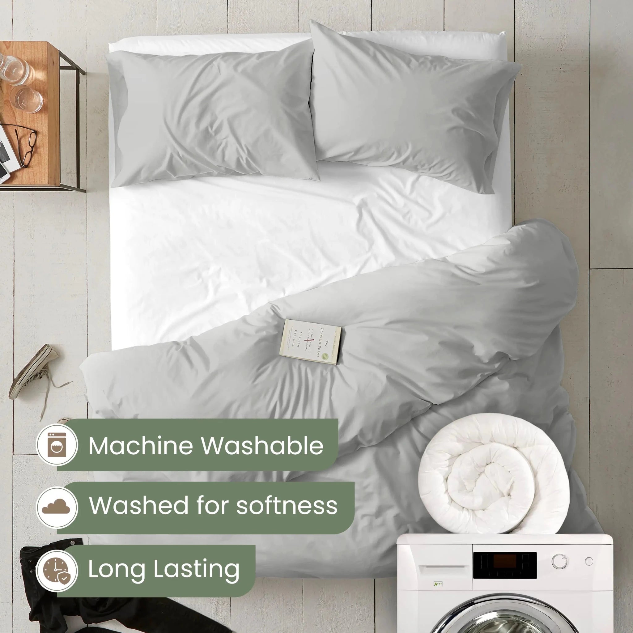 Light gray bedding set on a bed. Text overlays mention machine washability, softness after washing, and longevity.