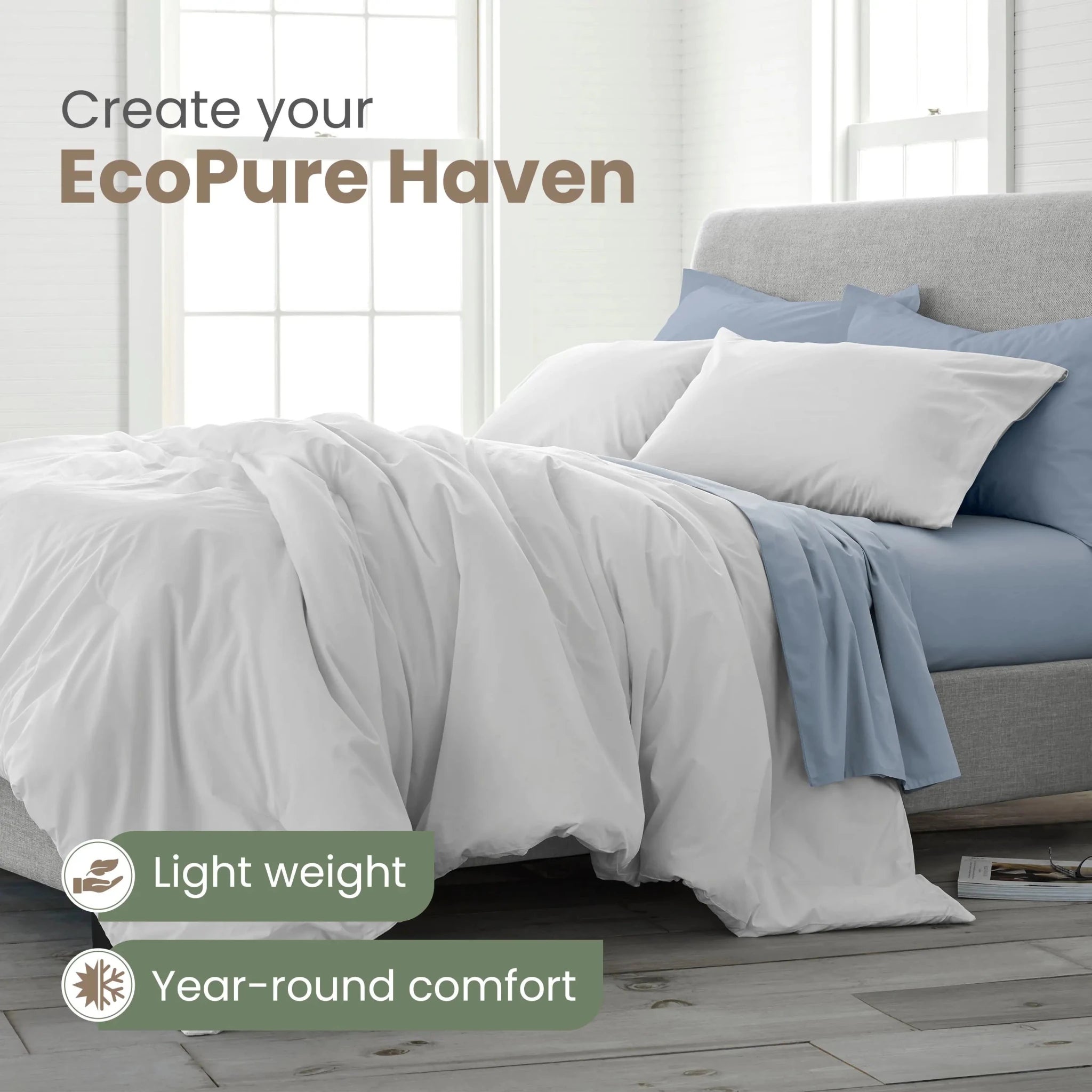 A neatly made bed in a bright bedroom setting with white bedding as the main product, including a comforter and pillowcases. Text overlays read 'Create your EcoPure Haven' and 'Light weight Year-round comfort'.
